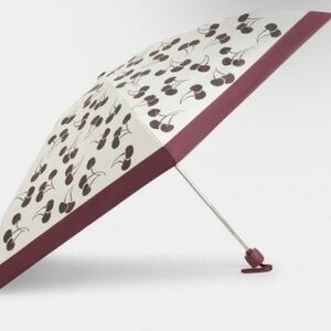 White with dark red Cherrys Coach Umbrella